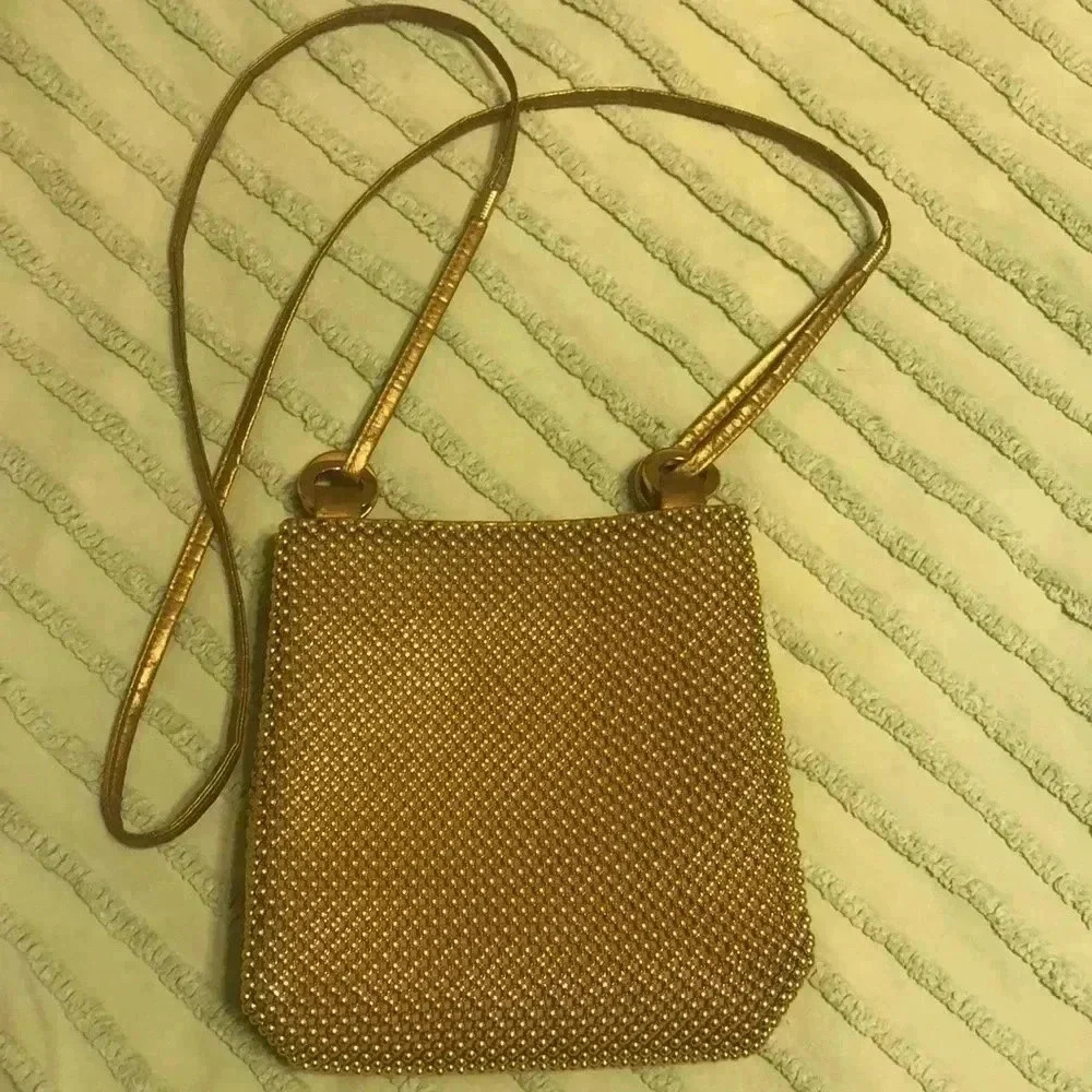 Vintage gold beaded crossbody bag with snap close